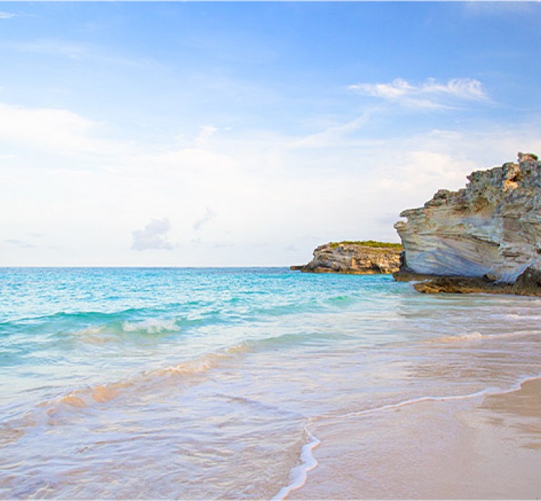 Pink sand beach and limestone cliffs on Eleuthera
